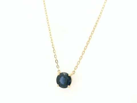 Round blue sapphire solitaire necklace in 18K yellow gold by Emirates Diamonds