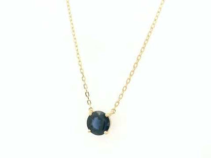 Round blue sapphire solitaire necklace in 18K yellow gold by Emirates Diamonds