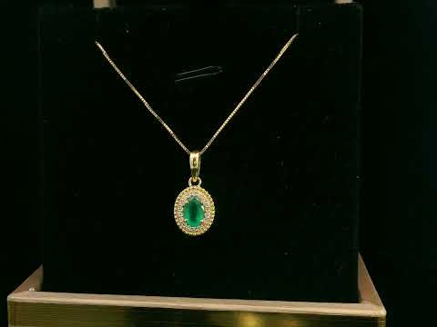 Oval-Cut Emerald & Diamond Halo Pendant in 18K Gold