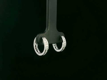 18K white gold channel-set diamond huggie earrings with round brilliant diamonds – Emirates Diamonds