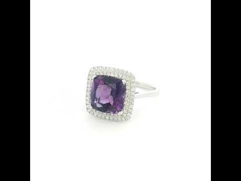 Cushion cut amethyst diamond halo ring in 18K white gold with double diamond halo