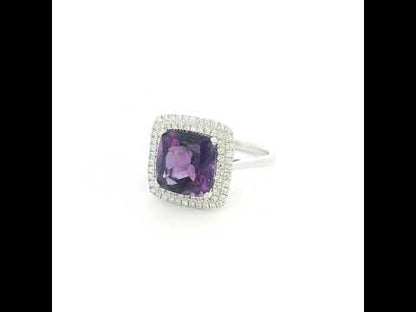Cushion cut amethyst diamond halo ring in 18K white gold with double diamond halo