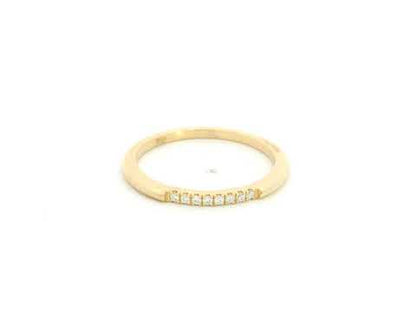 18K yellow gold slim diamond stacking ring featuring 0.06 carat natural diamonds in a minimalist band design