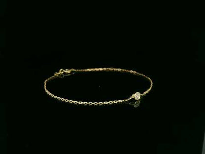 18K yellow gold diamond solitaire chain bracelet with bezel-set 0.14 carat diamond – Emirates Diamonds