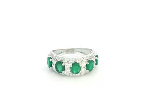 Emerald and diamond five-stone ring in 18K white gold with accents by Emirates Diamonds.