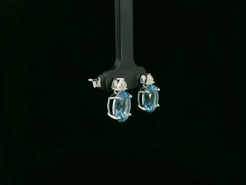 18K white gold stud earrings with oval Swiss Blue Topaz and  diamond accents