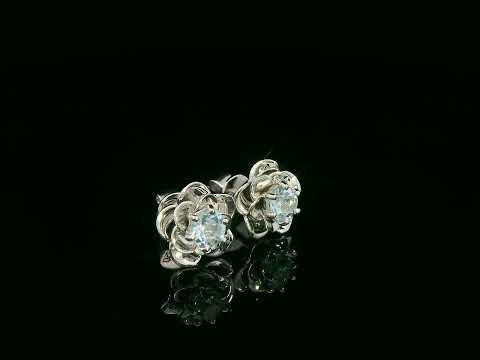 18K white gold aquamarine floral stud earrings – 1.03ct round aquamarine in sculpted flower setting, fine jewelry by Emirates Diamonds