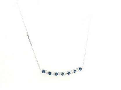 Blue sapphire and diamond bar necklace in 18K white gold featuring 0.74 carats of sapphires and 0.55 carats of diamonds by Emirates Diamonds.