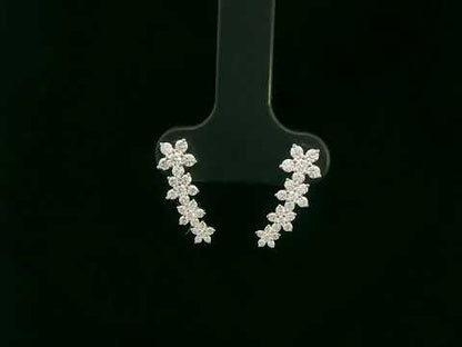 Diamond floral stud earrings in 18K white gold with 0.54 carat total diamond weight by Emirates Diamonds