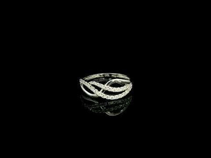 18K white gold diamond crossover ring featuring an elegant flowing design with 0.39 carat natural pavé-set diamonds.