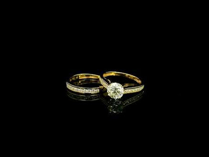 1.50 carat round diamond bridal set with matching diamond wedding band in 18K yellow gold