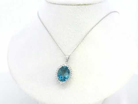 18k white gold oval London Blue Topaz halo pendant with diamonds – chain not included”