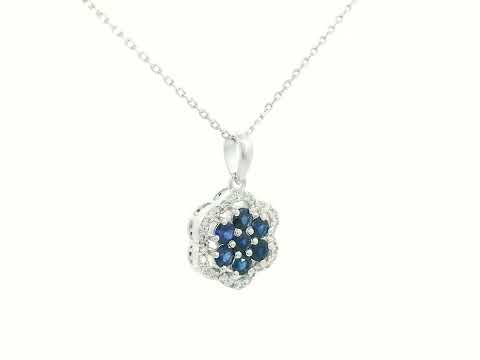 Delicate sapphire cluster pendant in floral design