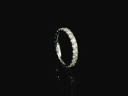 18K white gold full eternity diamond ring featuring 1.88 carats of natural round brilliant diamonds in prong setting, handcrafted as a made-to-order wedding band.