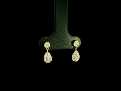 Diamond drop earrings with pear shaped teardrop design in 18K yellow gold