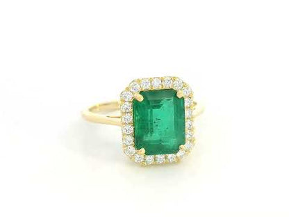 18K yellow gold emerald ring – 2.70ct emerald-cut emerald with 0.34ct diamond halo by Emirates Diamonds