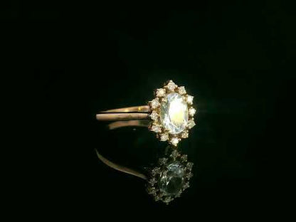 Oval Shape Aquamarine & Diamond Halo Ring in 18K Rose Gold