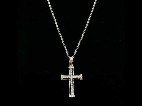 Diamond cross pendant in 18K white gold featuring an openwork design with round diamonds and diamond-accented ends.