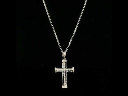 Diamond cross pendant in 18K white gold featuring an openwork design with round diamonds and diamond-accented ends.