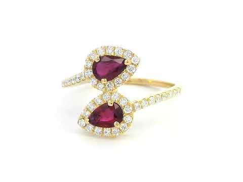 Double pear ruby and diamond bypass ring in 18K gold with halo setting – 0.80ct rubies and 0.39ct diamonds