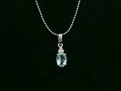 Oval aquamarine and diamond pendant in 18K white gold by Emirates Diamonds