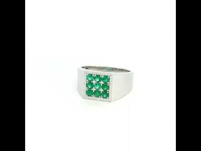 Men’s emerald and diamond signet ring in 18K white gold with nine round emeralds framed by natural diamonds.