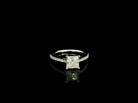 18K white gold engagement ring featuring a 1.50 carat IGI certified natural princess cut diamond with G color and SI2 clarity, accented by 0.20 carat natural round brilliant diamonds on the band.
