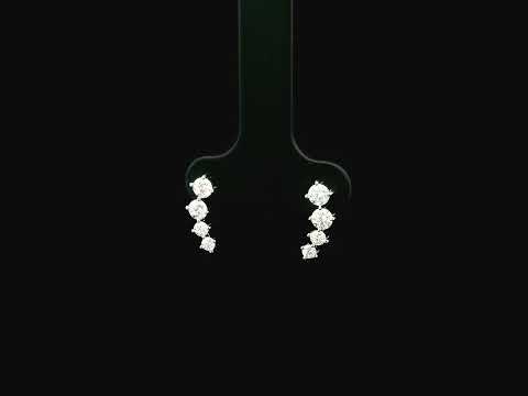 Graduated natural diamond drop earrings in 18K white gold, 0.55 carat total diamond weight.
