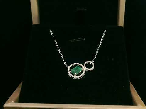 18K white gold necklace featuring a 0.63ct emerald-cut emerald and 0.15ct diamond double-circle pendant, designed for modern elegance and layering versatility