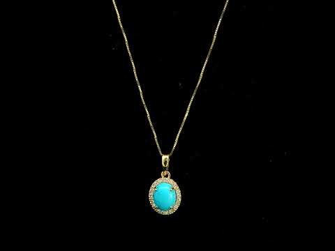 Natural turquoise diamond halo pendant in solid 18K yellow gold featuring a 1.22 carat oval turquoise surrounded by 0.12 carat natural diamonds.