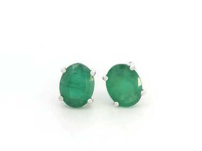 Oval-cut emerald stud earrings in 18K white gold with 3.87 carat total emerald weight by Emirates Diamonds