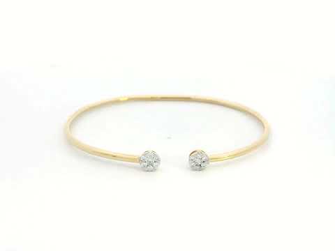 18K gold open bangle with round diamond cluster ends totaling 0.46 carats