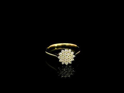 Diamond cluster ring in 18K yellow gold featuring 0.35 carat of round natural diamonds in a floral-inspired arrangement