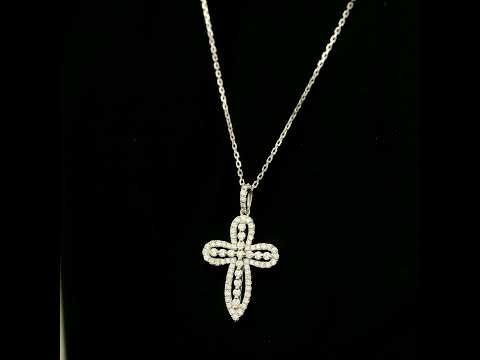 Openwork diamond cross pendant in 18K white gold with round diamond borders, central diamond accents and a diamond-set bail, displayed on a chain.