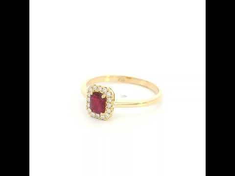Ruby and diamond halo ring in 18K yellow gold with rectangular red ruby, round diamond surround and polished gold band.