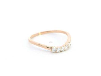 Diamond contour band ring in 18K rose gold by Emirates Diamonds