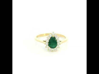 Pear shaped natural emerald diamond halo ring in 18K yellow gold