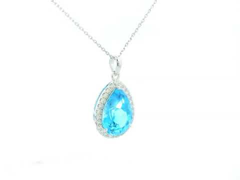 Pear-shaped Swiss Blue Topaz pendant in 18K white gold with diamond halo