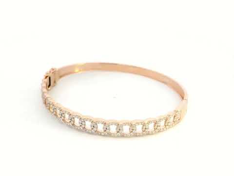 Unisex Cuban link diamond bangle in 18K rose gold with 1.26 carats of round-cut diamonds.
