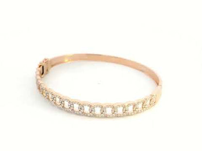 Unisex Cuban link diamond bangle in 18K rose gold with 1.26 carats of round-cut diamonds.