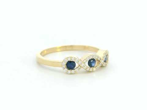 18K gold infinity ring with blue sapphires and diamonds