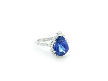 Pear cut tanzanite ring 3.83 carat with diamond halo in 18K white gold by Emirates Diamonds