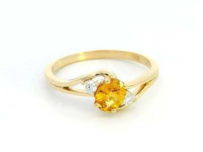 18K gold yellow sapphire and diamond ring with split shank design, featuring a 0.66-carat vibrant sapphire and 0.10-carat diamond accents – September birthstone jewelry