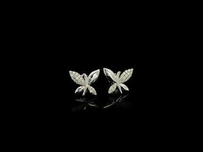 18K white gold butterfly stud earrings featuring 0.24 carat natural round brilliant diamonds with polished white gold wings.