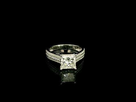 Natural princess cut diamond engagement ring in 18K white gold featuring a 2.19 carat IGI-certified F colour VS1 clarity centre diamond and 0.42 carat of round diamonds along the pavé-set band.