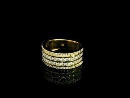 Wide diamond band ring in 18K yellow gold featuring four rows of round diamonds separated by polished gold bands.
