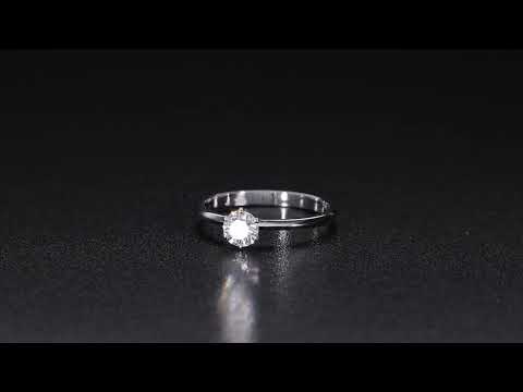 Round brilliant cut diamond solitaire engagement ring in 18K white gold featuring a 0.50 carat natural diamond in a six-prong setting on a slim polished band.