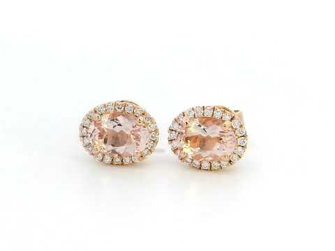 Elegant 18K gold stud earrings featuring 1.40 carats of oval-cut morganite gemstones, each encircled by a halo of 0.19 carats of round diamonds, secured with a push-back closure for timeless sophistication.







