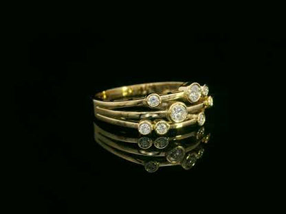 18K yellow gold multi-row diamond ring with bezel-set round diamonds, 0.23 carat diamonds, modern fine jewelry by Emirates Diamonds
