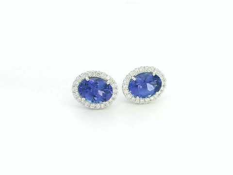 Tanzanite and diamond halo stud earrings in 18K white gold by Emirates Diamonds.
